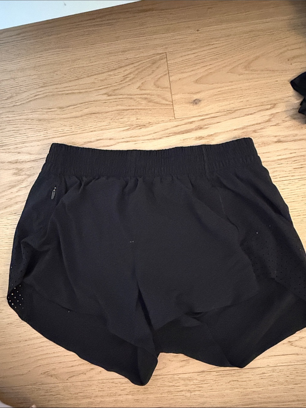 Athleta Black Women's Athletic Shorts with Perforated Side Panels